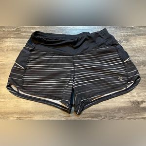 Ladies Size Extra Small. Athleta Brand. Athletic Shorts. Black Stripes. Euc